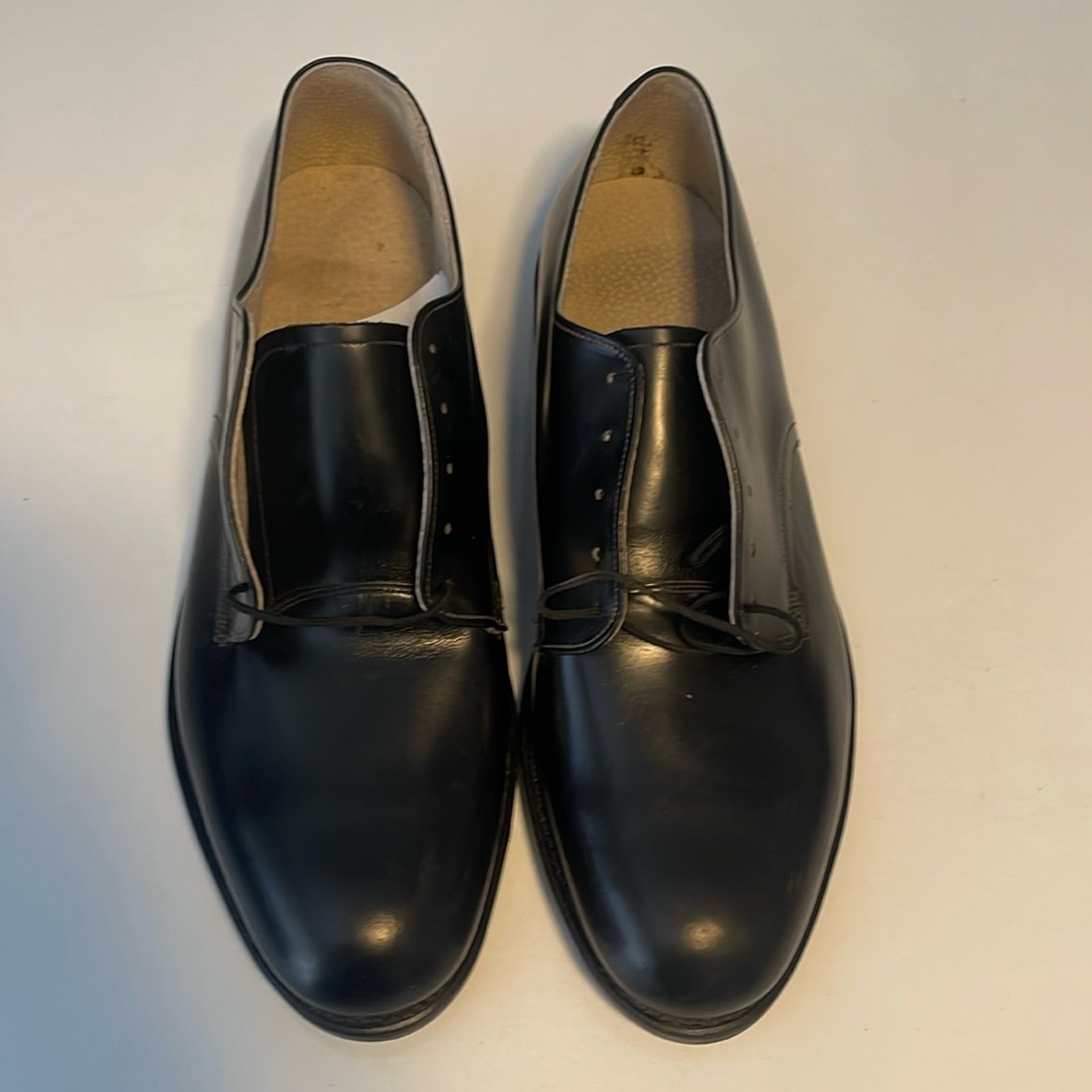 Men’s Wolverine, black Oxford, size 14 R water resistance, and slip proof